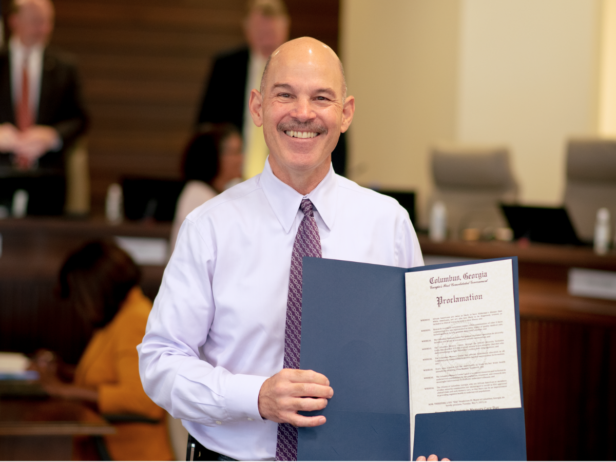 Dr. Jonathan Liss is honored with a "Diversity in Memory Care" proclamation from Columbus city council